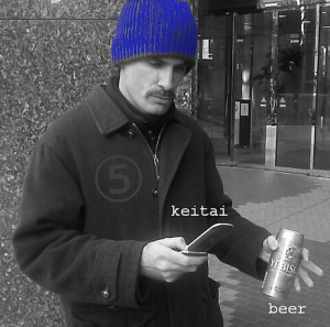mike smith with phone and beer